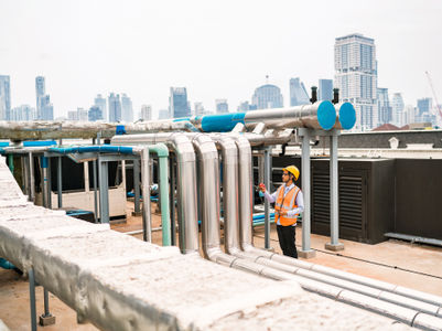 Blogs/Images/field-operations-photography-lifestyle-engineer-rooftop-industrial-pipe-city-4x3-3600x2700.jpg.imgw.3600.3600.jpg